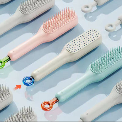 مشط إزالة الشعر المتساقط بضغطة واحدة