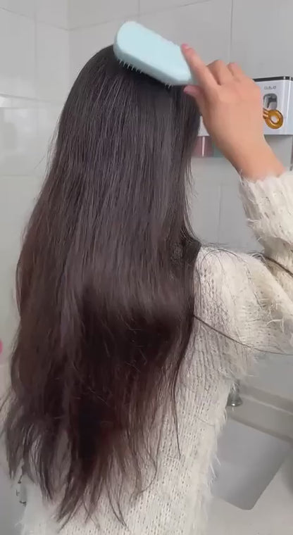 مشط إزالة الشعر المتساقط بضغطة واحدة